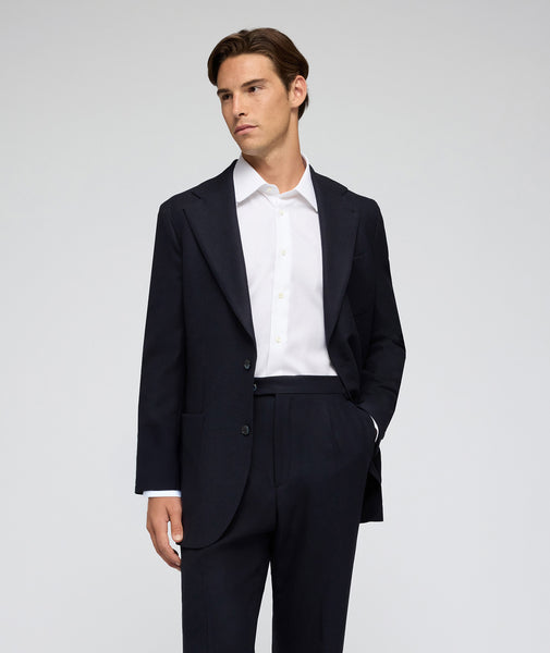 Traje azul de sarga de lana jersey